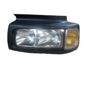 Farol Volvo VM Canavieiro com Moldura e Pisca